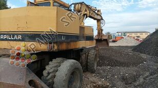 Caterpillar 212 wheel excavator