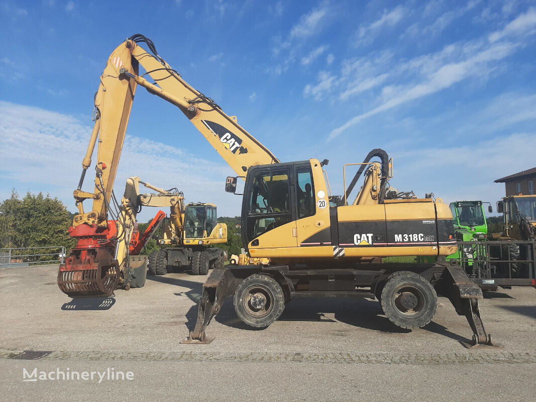 Caterpillar M318C MH wheel excavator